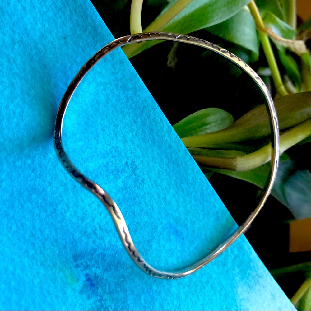 Wavy sterling silver bangle. Unmarked